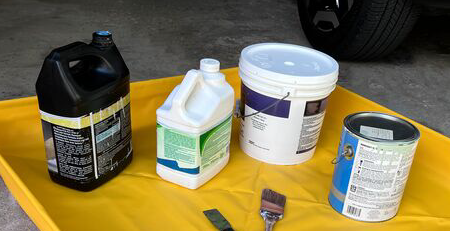 Common materials that should be stored in a fire safety cabinet Collection of paint, thinners and other flammable chemicals